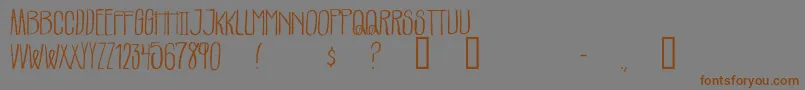 Parachutes Font – Brown Fonts on Gray Background