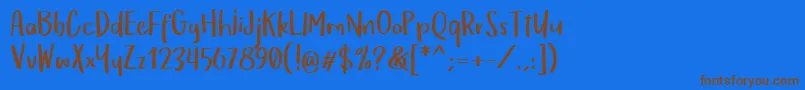 OmTeloletOm Font – Brown Fonts on Blue Background