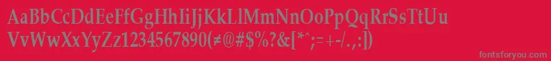 PalisadecondensedBold-fontti – harmaat kirjasimet punaisella taustalla