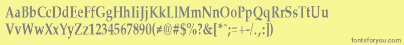 PalisadecondensedBold-fontti – harmaat kirjasimet keltaisella taustalla