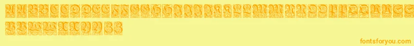 フォントUngerfrakturzierbuchstaben – オレンジの文字が黄色の背景にあります。