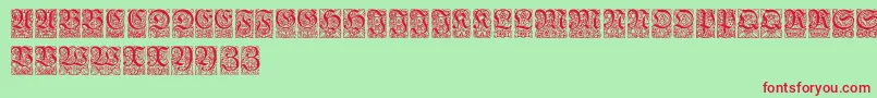 Ungerfrakturzierbuchstaben Font – Red Fonts on Green Background