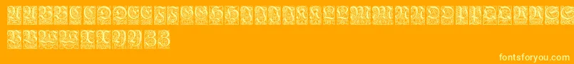 Fonte Ungerfrakturzierbuchstaben – fontes amarelas em um fundo laranja