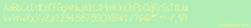 Yummycupcakes Font – Yellow Fonts on Green Background