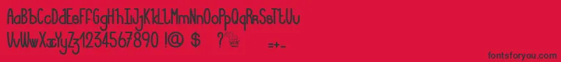 フォントLucieMandragore – 赤い背景に黒い文字