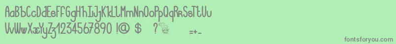 フォントLucieMandragore – 緑の背景に灰色の文字