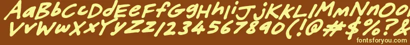 FriendlyFeltTipsItalic-fontti – keltaiset fontit ruskealla taustalla