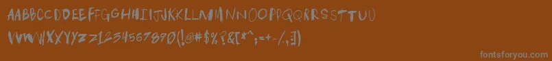 フォントTakenp – 茶色の背景に灰色の文字