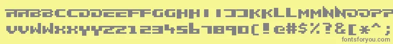 Frankieghost-fontti – harmaat kirjasimet keltaisella taustalla