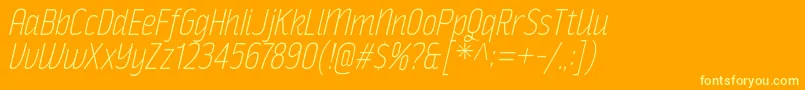 Czcionka RakeslyElIt – żółte czcionki na pomarańczowym tle