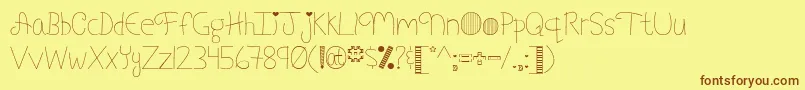Шрифт MyFontAddictionByMistisFonts – коричневые шрифты на жёлтом фоне