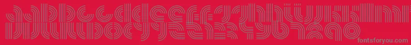 フォントRadfahrenLower – 赤い背景に灰色の文字