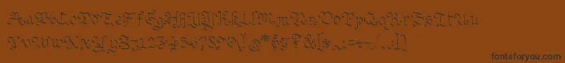 フォントOhmygoth – 黒い文字が茶色の背景にあります