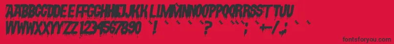 Fonte VampyrishabcOblique – fontes pretas em um fundo vermelho