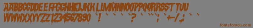 Fonte VampyrishabcOblique – fontes marrons em um fundo cinza