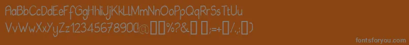 Babie Font – Gray Fonts on Brown Background