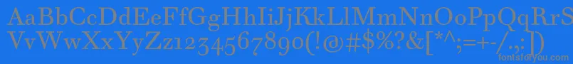 フォントWalbaumTextPro – 青い背景に灰色の文字