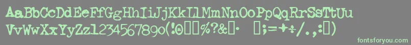 フォントGhostwriter – 灰色の背景に緑のフォント