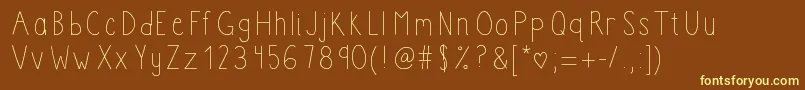 Boomclapac-Schriftart – Gelbe Schriften auf braunem Hintergrund