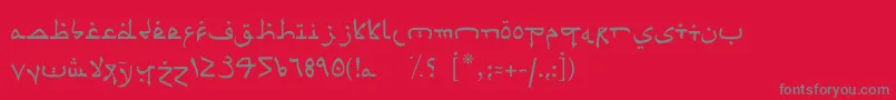 フォントPsuedoSaudi – 赤い背景に灰色の文字