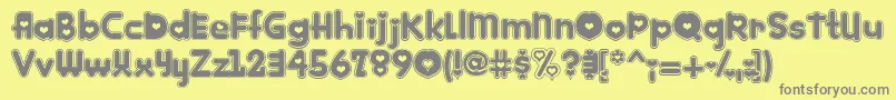 Kinkie Font – Gray Fonts on Yellow Background