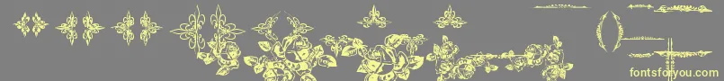 フォントEutemiaOrnaments – 黄色のフォント、灰色の背景