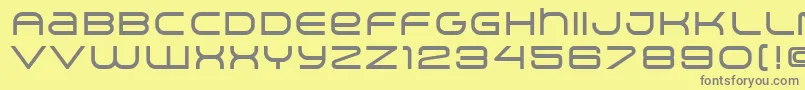 ArkitechMedium-fontti – harmaat kirjasimet keltaisella taustalla