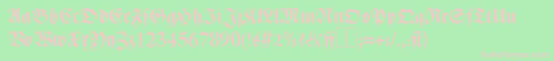 Z690BlackletterBold-Schriftart – Rosa Schriften auf grünem Hintergrund