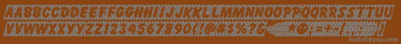 Skidz Font – Gray Fonts on Brown Background