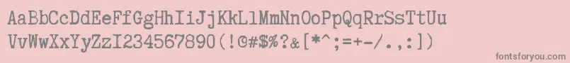 フォントTruetypewriterPolyglott – ピンクの背景に灰色の文字