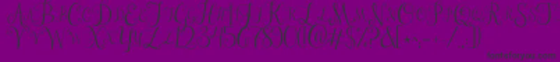 Jandastylishmonogram-fontti – mustat fontit violetilla taustalla
