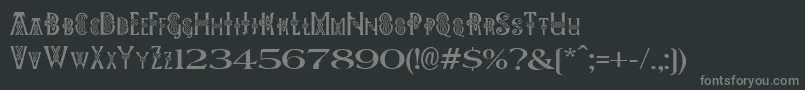 PeesCelticPlain-fontti – harmaat kirjasimet mustalla taustalla