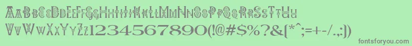 フォントPeesCelticPlain – 緑の背景に灰色の文字