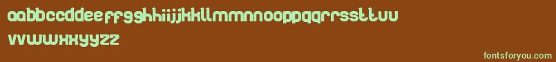 En savoir plus sur la police Artistic Police Artistic – polices vertes sur fond brun