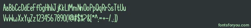 フォントCupcakeSmilesBold – 黒い背景に緑の文字
