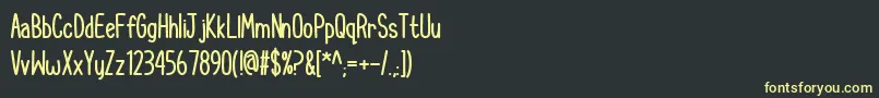 CupcakeSmilesBold Font – Yellow Fonts on Black Background