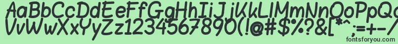 フォントBloklettersViltstift – 緑の背景に黒い文字