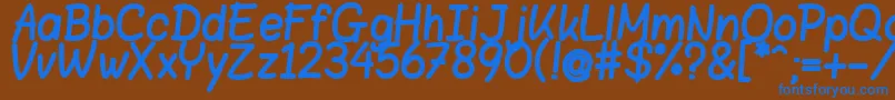 BloklettersViltstift-fontti – siniset fontit ruskealla taustalla
