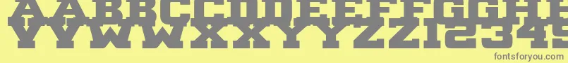 B1gBlock2 Font – Gray Fonts on Yellow Background