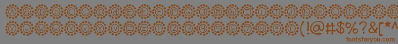 Fonte Kbmosaic – fontes marrons em um fundo cinza