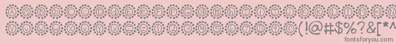 フォントKbmosaic – ピンクの背景に灰色の文字