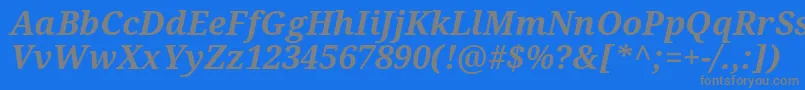 フォントNotoSerifBoldItalic – 青い背景に灰色の文字