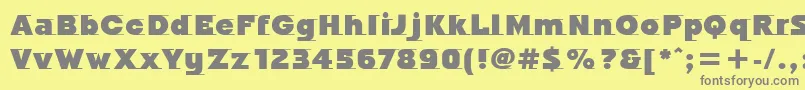 OdysseeItcUltra Font – Gray Fonts on Yellow Background