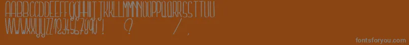 More about TellMeASecretLight Font TellMeASecretLight Font – Gray Fonts on Brown Background