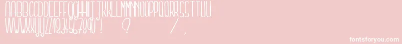 フォントTellMeASecretLight – ピンクの背景に白い文字