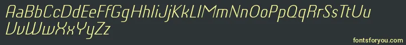 ChiqReducedLightitalic-Schriftart – Gelbe Schriften auf schwarzem Hintergrund