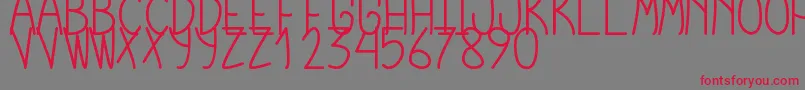 フォントCursiExtraTfb – 赤い文字の灰色の背景