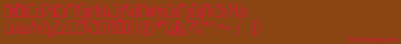 フォントKashmir – 赤い文字が茶色の背景にあります。