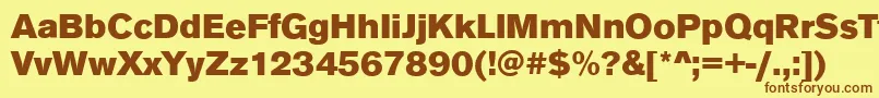 フォントAnconaBlackRegular – 茶色の文字が黄色の背景にあります。