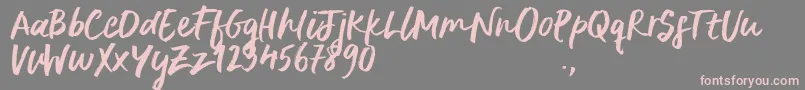 フォントDeliriumSample – 灰色の背景にピンクのフォント